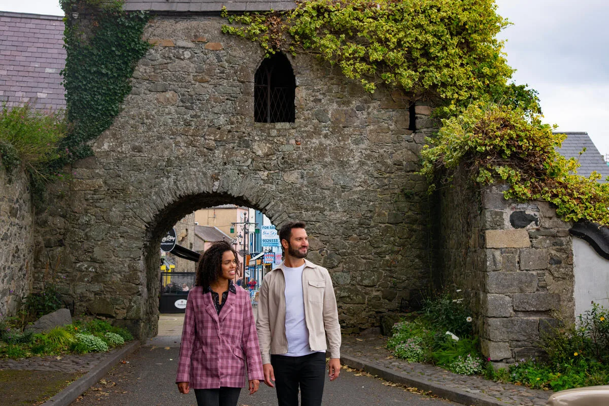 Couple Visiting Tholsel Street 04 Carlingford Co Louth 140922CH580.Jpg TI72QIG scenery on self-guided walking holiday in I...