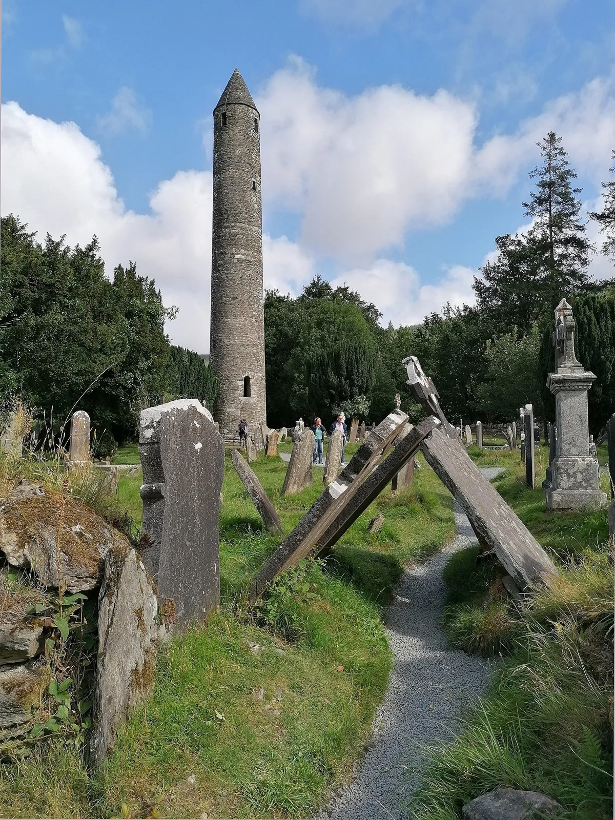 The round tower at Glendalough monastic site, a highlight stop among the Wicklow Way towns and villages