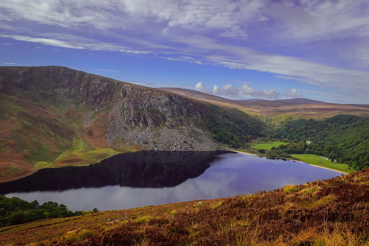 Lough Tay and the cliffs of Luggala seen from above, near the Wicklow Way in the Wicklow Mountains
