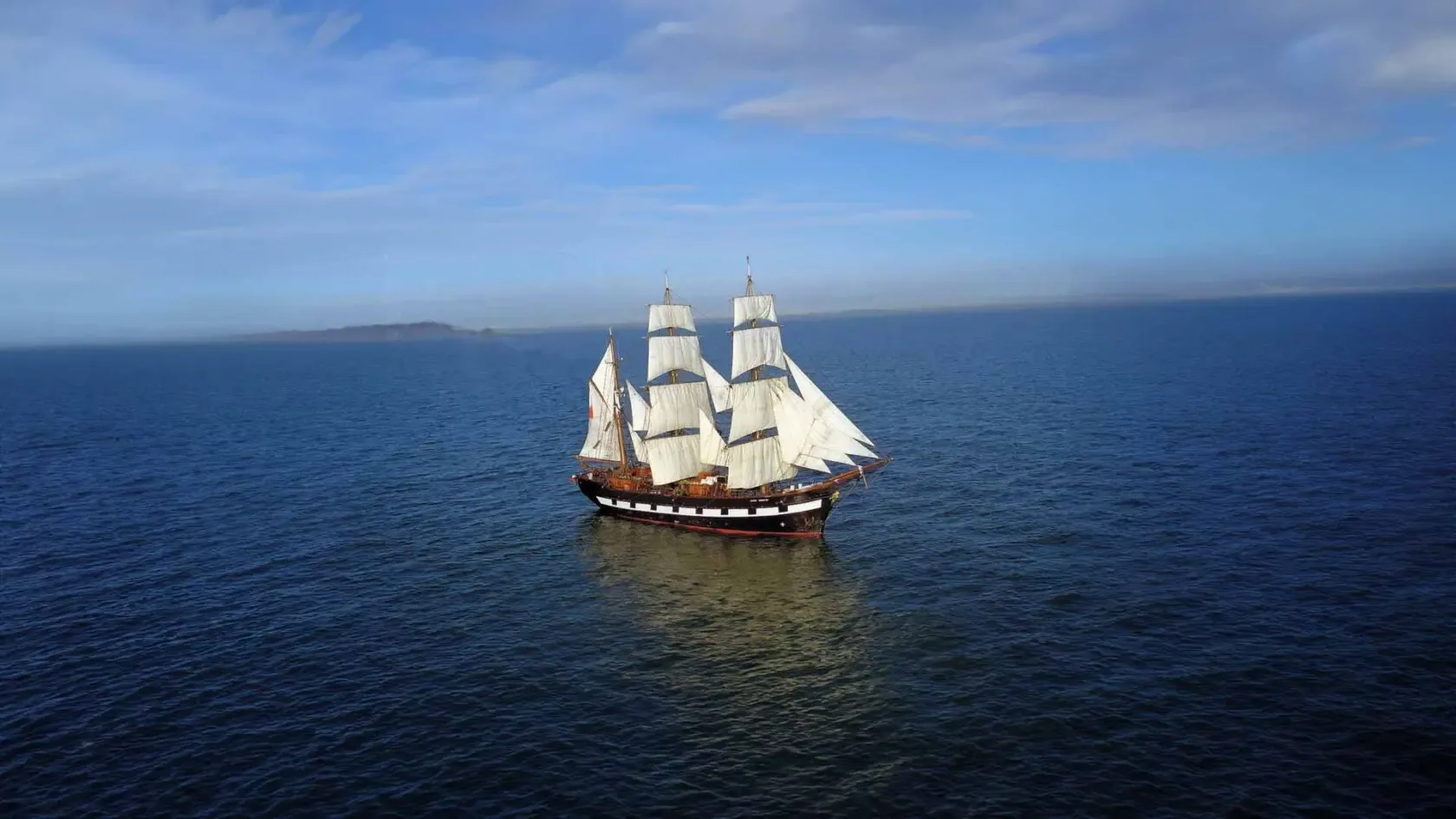 A tall sailing ship of the 1840s type that carried famine emigrants